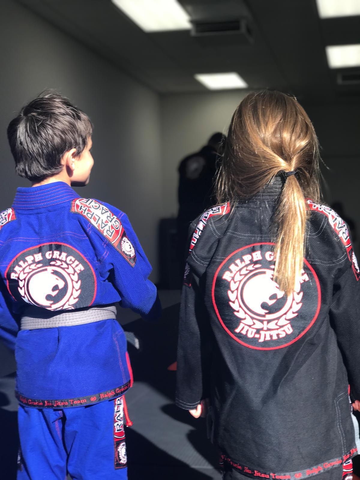 Two Mission Jiu Jitsu students with Ralph Gracie patches