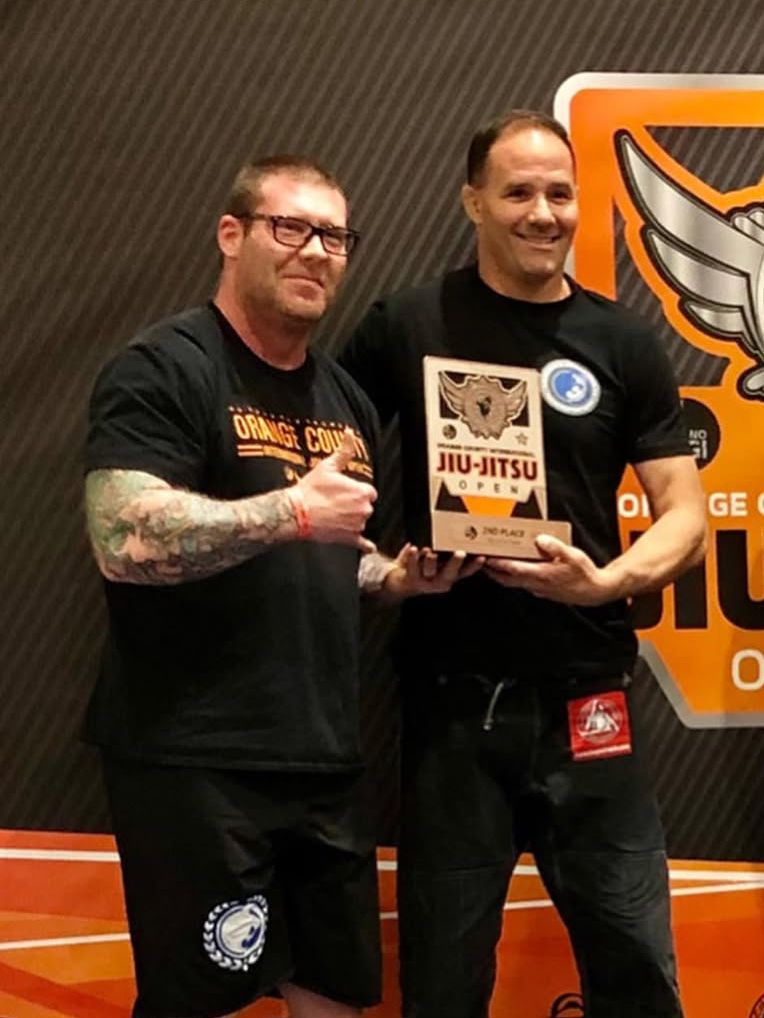 Professor Bob with 2nd place trophy at Orange County Jiu-Jitsu Open