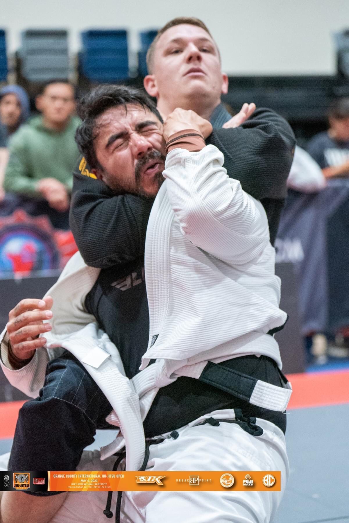 Adult competitor with back-take choke at Orange County International Jiu-Jitsu Open 2023