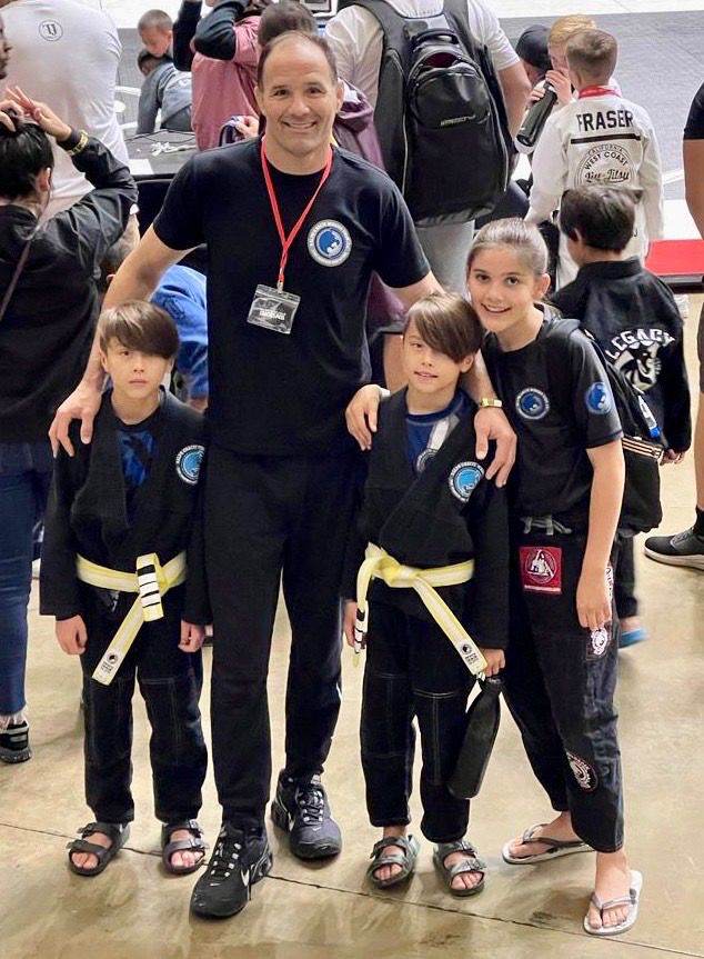 Professor Bob with kids team at a tournament