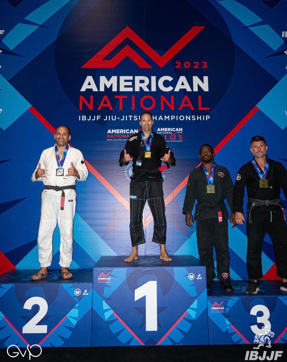 Professor Bob on top of podium at 2023 IBJJF American National Jiu-Jitsu Championship