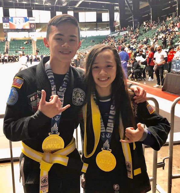 Mission Jiu Jitsu kids with gold medals at tournament
